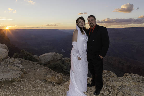 Sunset picture of a couple that just got married at the Grand Canyon