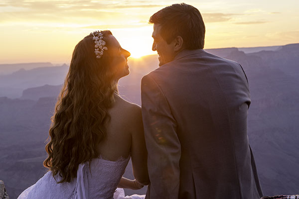 Bride and Groom enjoying a sunset at the Grand Canyon after their wedding