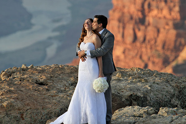 A young couple about to get married on the South Rim of the Grand Canyon
